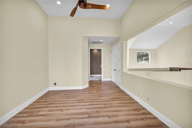 spare room with ceiling fan and light hardwood / wood-style floors