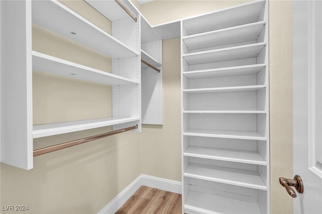 walk in closet featuring light wood-type flooring