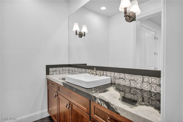 bathroom with tile patterned flooring and vanity