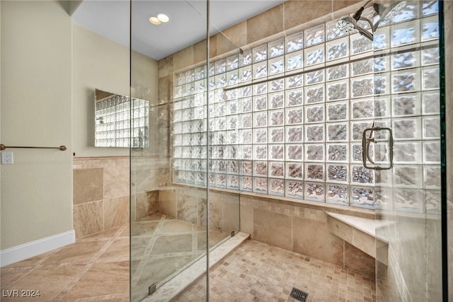 bathroom with an enclosed shower