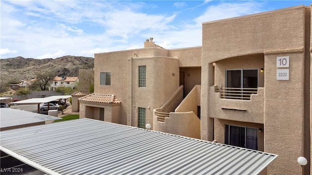 exterior space featuring a mountain view