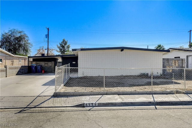 view of front of house featuring a carport