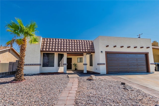 view of front of property featuring a garage