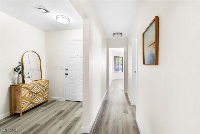 hall featuring light hardwood / wood-style flooring