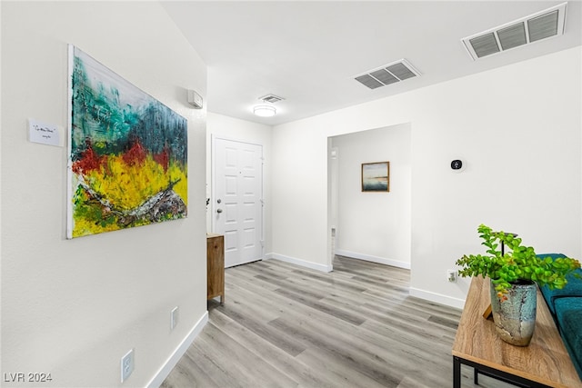 hallway featuring light hardwood / wood-style floors