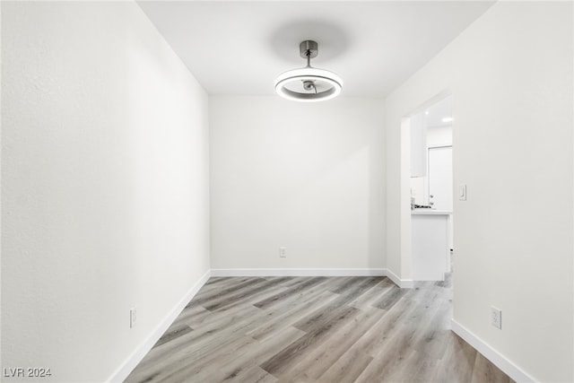 spare room featuring light wood-type flooring