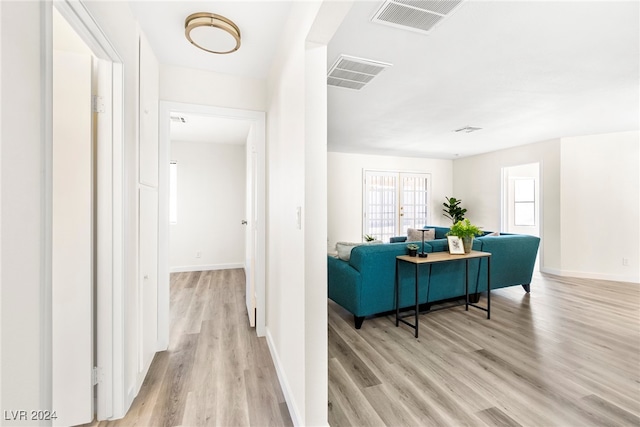 hallway featuring light hardwood / wood-style flooring