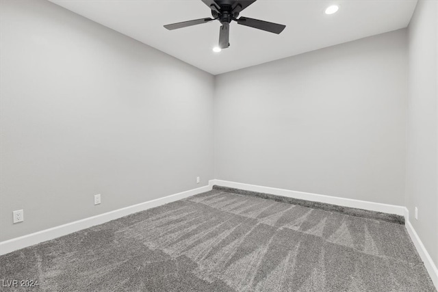 empty room with carpet and ceiling fan