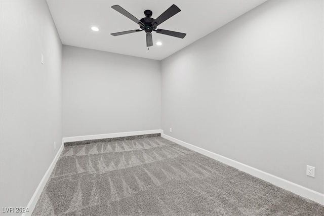 carpeted empty room with ceiling fan