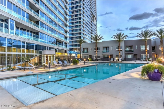 4525 Dean Martin Dr Unit 302, Las Vegas, NV 89103 - community pool featuring a patio