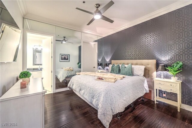 4525 Dean Martin Dr Unit 302, Las Vegas, NV 89103 - bedroom featuring ornamental molding, dark wood-type flooring, and a ceiling fan