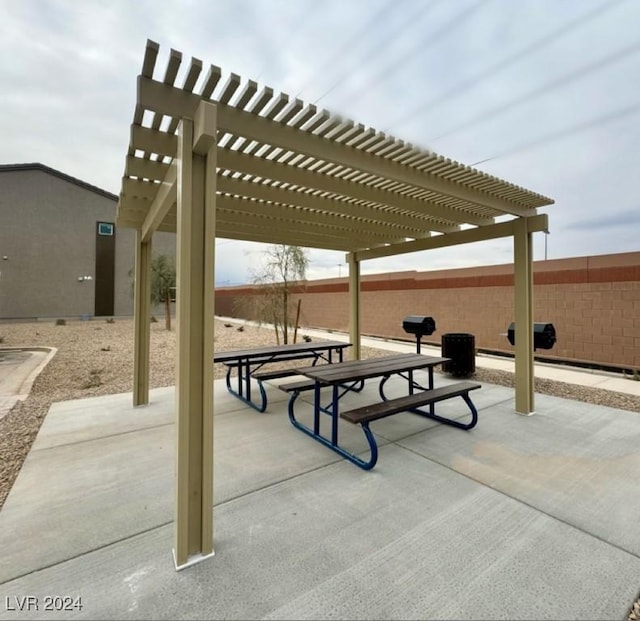 view of patio featuring a pergola