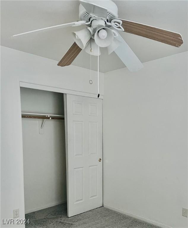 unfurnished bedroom with a closet, ceiling fan, and light colored carpet