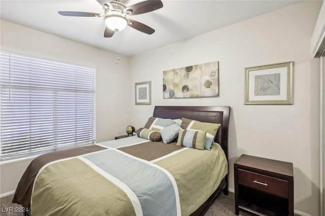 bedroom featuring ceiling fan and carpet flooring