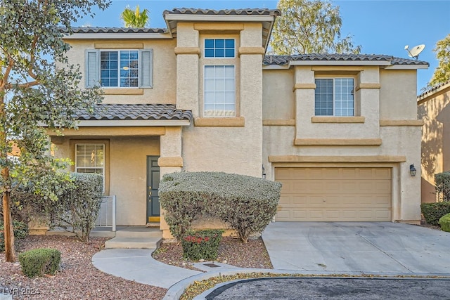 view of front of home with a garage