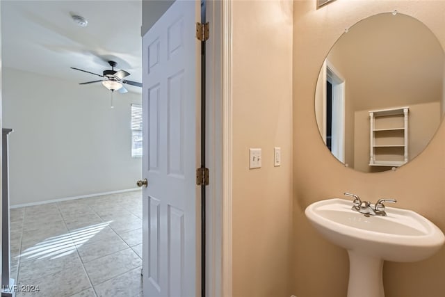 bathroom with tile patterned floors, ceiling fan, and sink