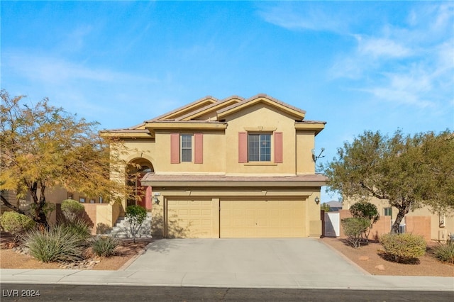 view of front of home with a garage