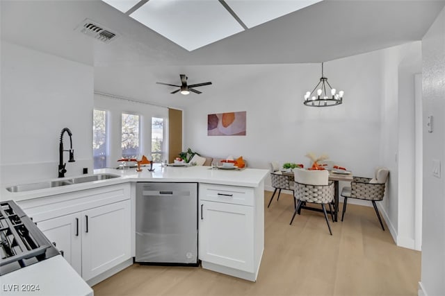 kitchen with white cabinetry, dishwasher, hanging light fixtures, and sink