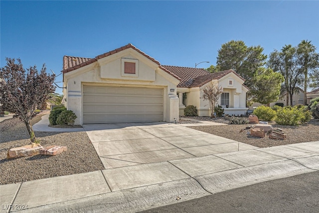 view of front of property featuring a garage