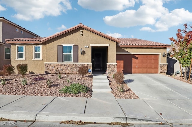 view of front of home with a garage