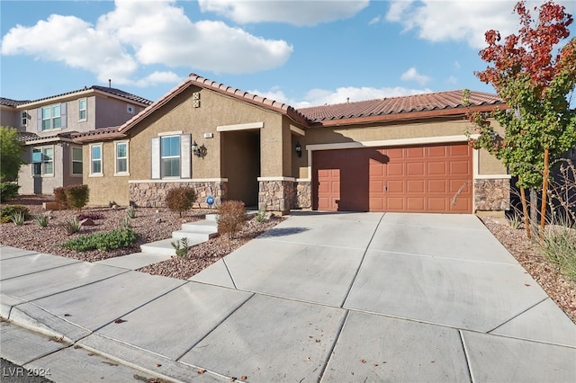 view of front of home with a garage