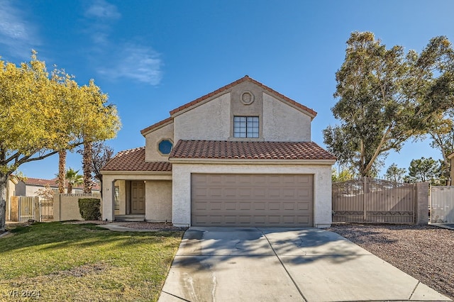 mediterranean / spanish-style house with a front yard and a garage