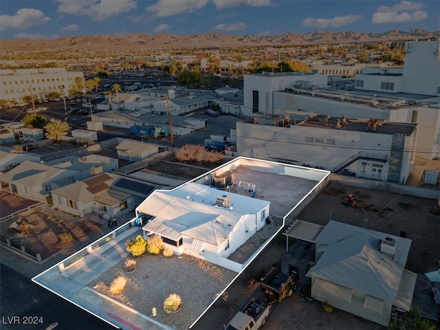 bird's eye view with a mountain view