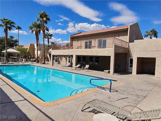 view of pool featuring a patio area