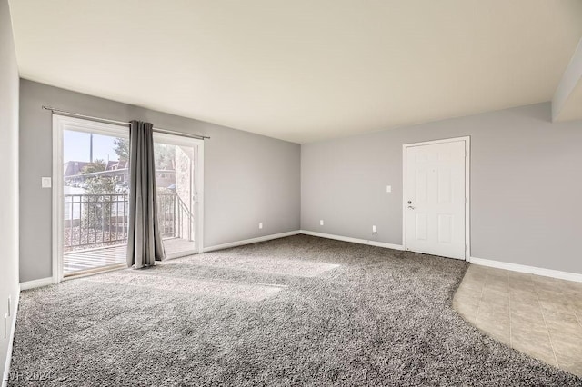 empty room featuring carpet floors