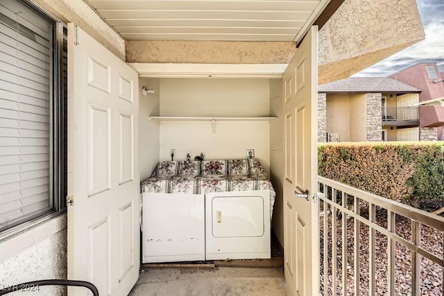 laundry room with washer and dryer