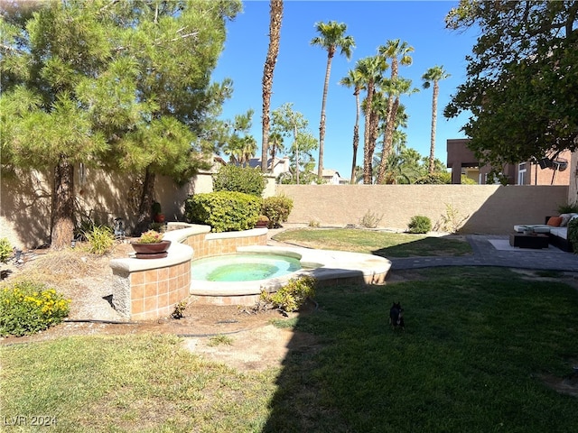 view of yard featuring a hot tub