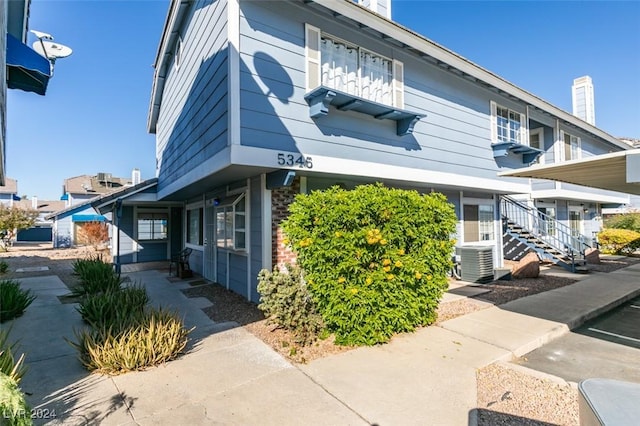 view of front of home with central AC unit