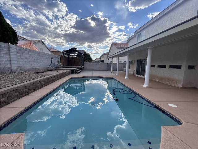 view of pool featuring a patio