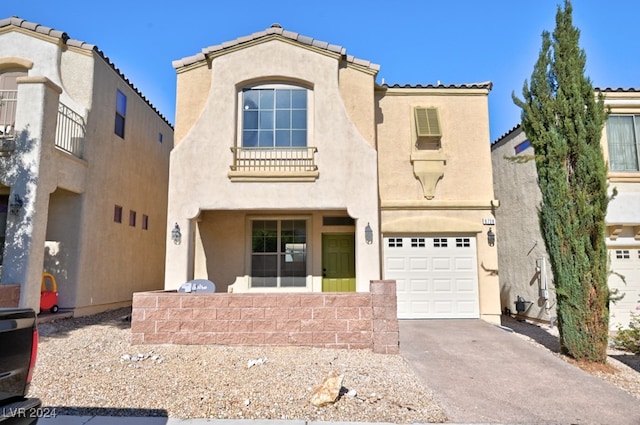 view of front of home with a garage