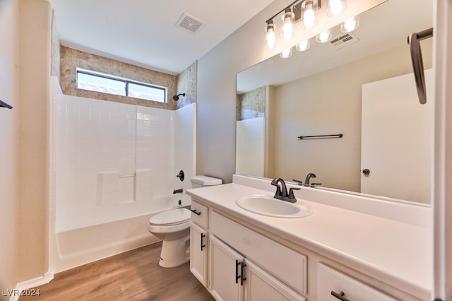 full bathroom with shower / bathtub combination with curtain, toilet, vanity, and hardwood / wood-style flooring