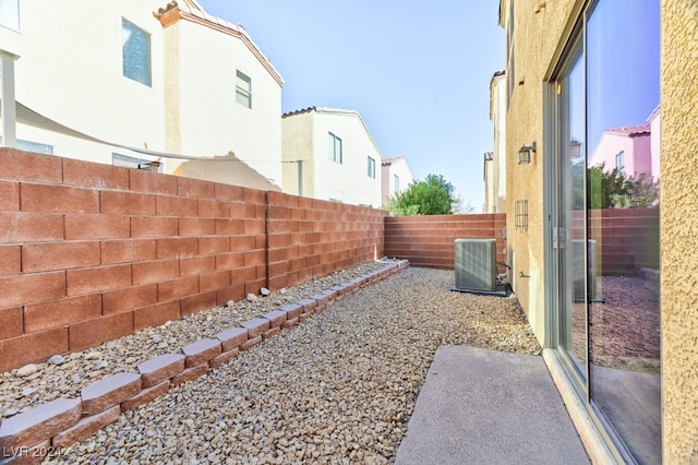 view of yard with central AC unit