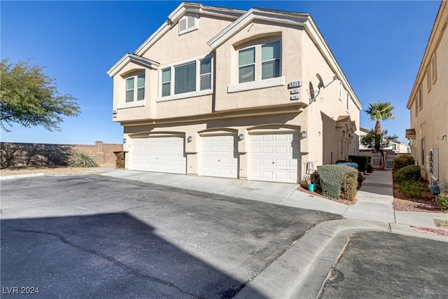 view of property featuring a garage