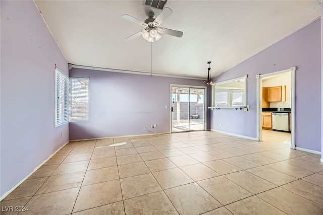 tiled spare room with ceiling fan and lofted ceiling