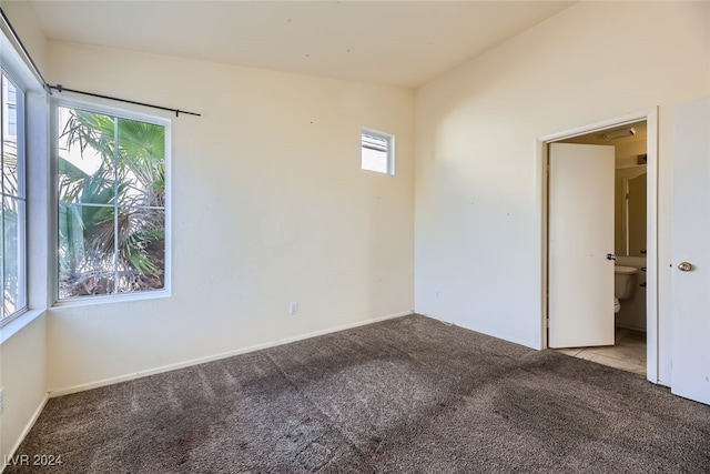 empty room with carpet and a healthy amount of sunlight