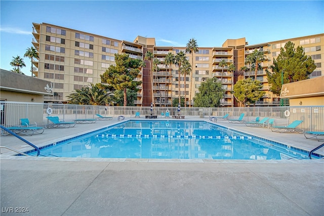 view of swimming pool with a patio