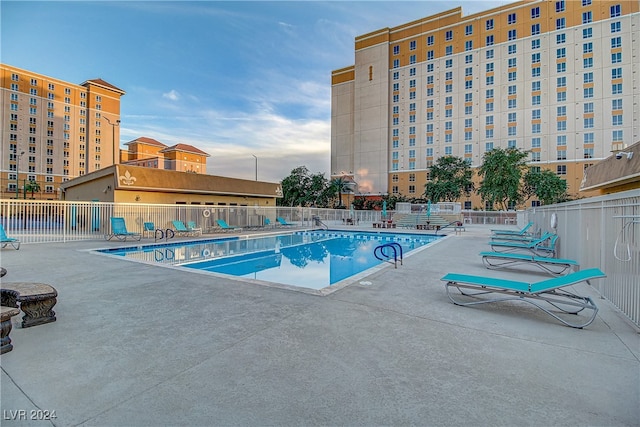 view of swimming pool featuring a patio