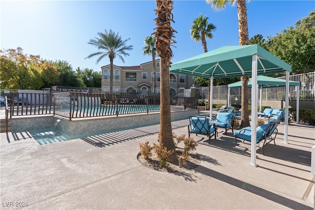 view of pool featuring a patio area