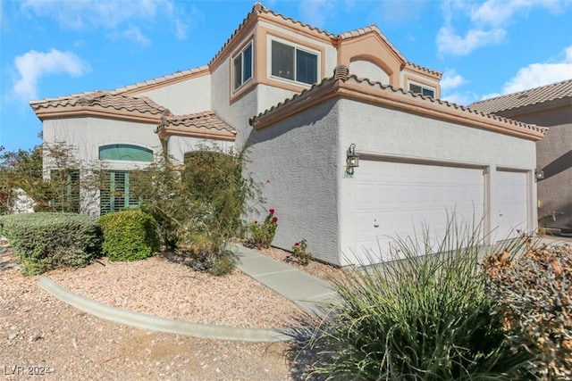 view of mediterranean / spanish-style house