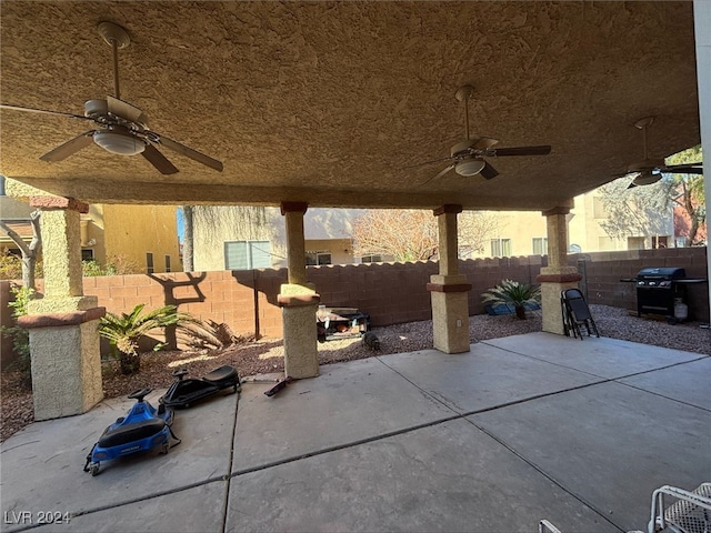 view of patio / terrace with grilling area and ceiling fan