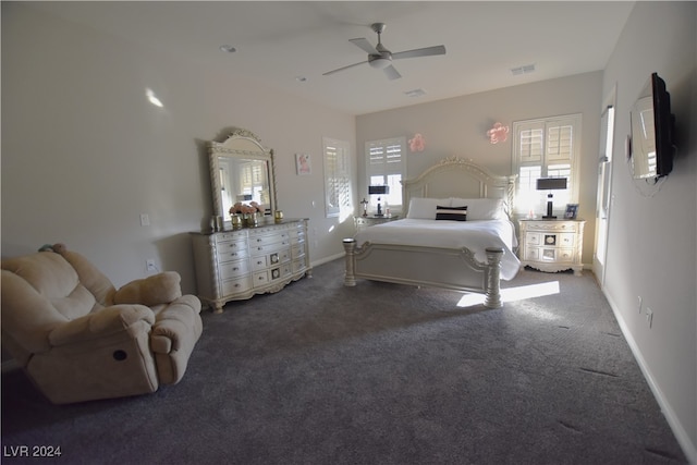 bedroom featuring dark colored carpet and ceiling fan