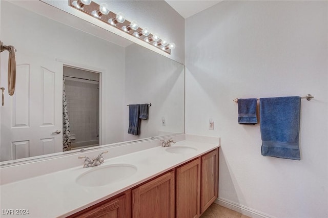 bathroom featuring vanity and tile patterned floors