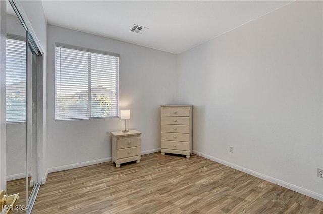 bedroom featuring light hardwood / wood-style floors