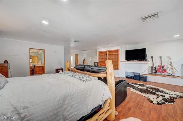 bedroom featuring wood-type flooring