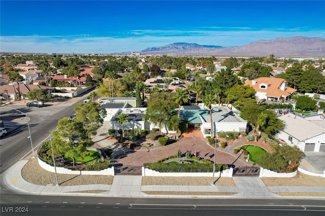 birds eye view of property featuring a mountain view