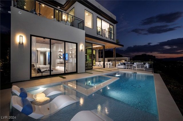 view of pool featuring an in ground hot tub and a patio area